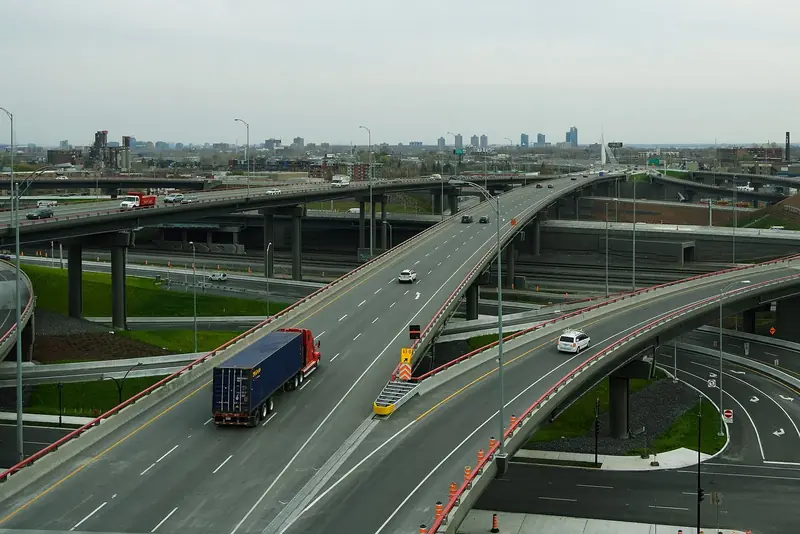 Trucks and cars on a large highway interchange